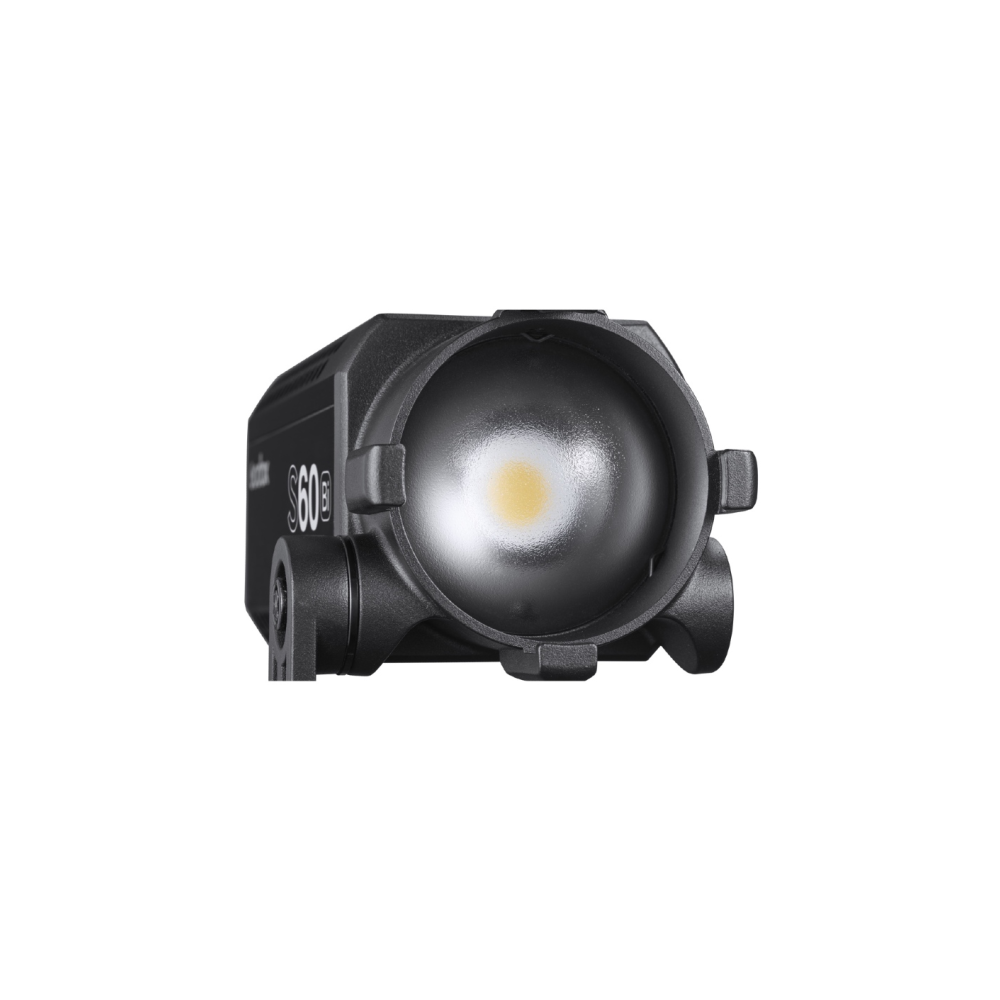 Een zwarte LED-spot met "S60"-markering en een gloeiend licht binnenin.
