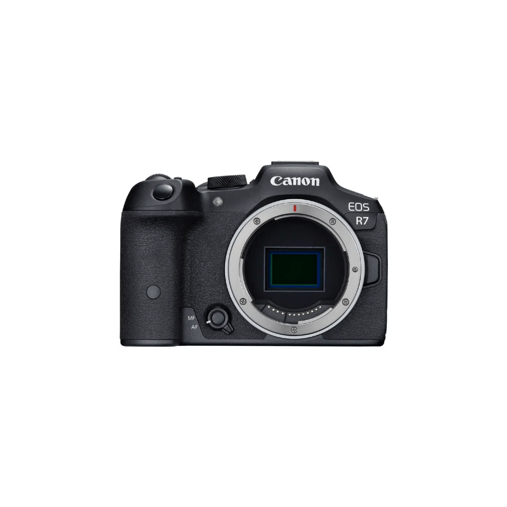 A black Canon EOS R7 camera with a silver lens mount.