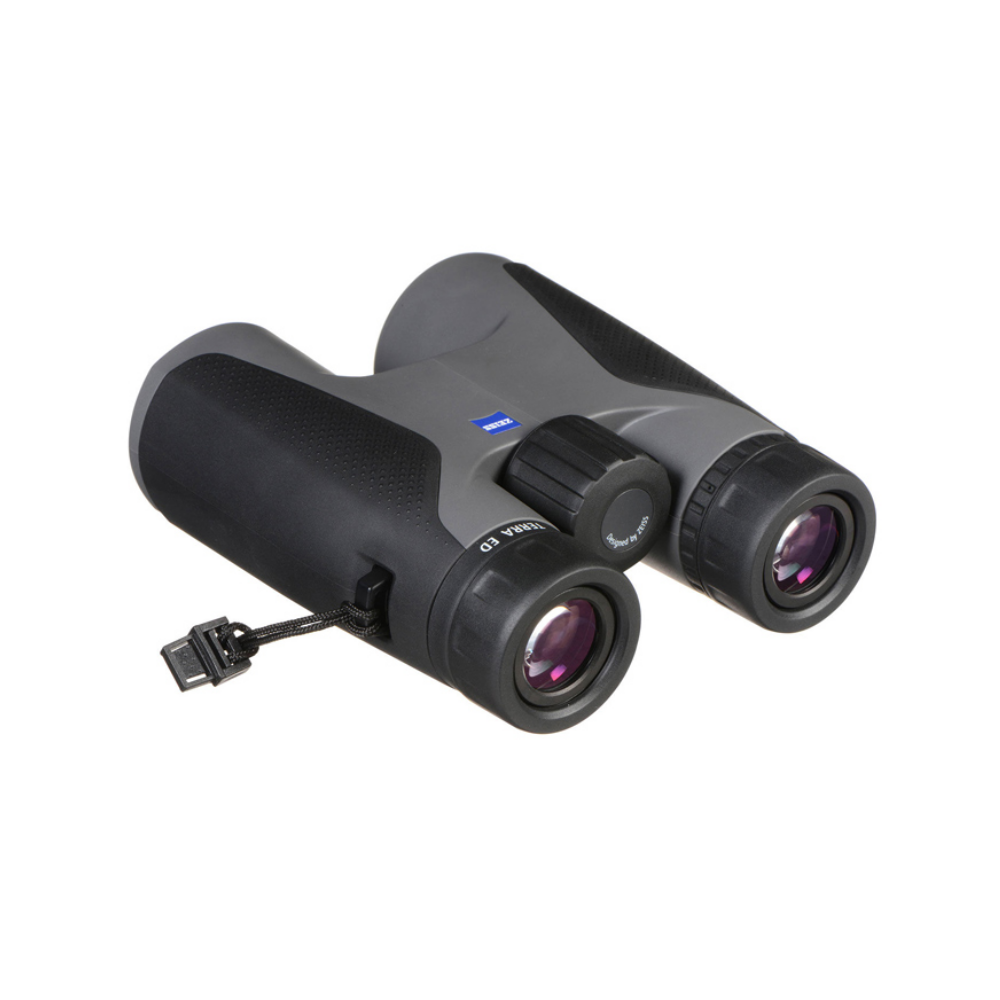 Gray and black binoculars with a strap, isolated on a white background.