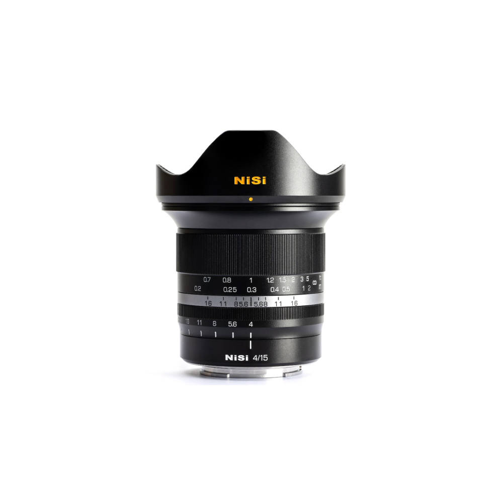 A black Nisi 4/15 camera lens with focus and aperture markings on white background.