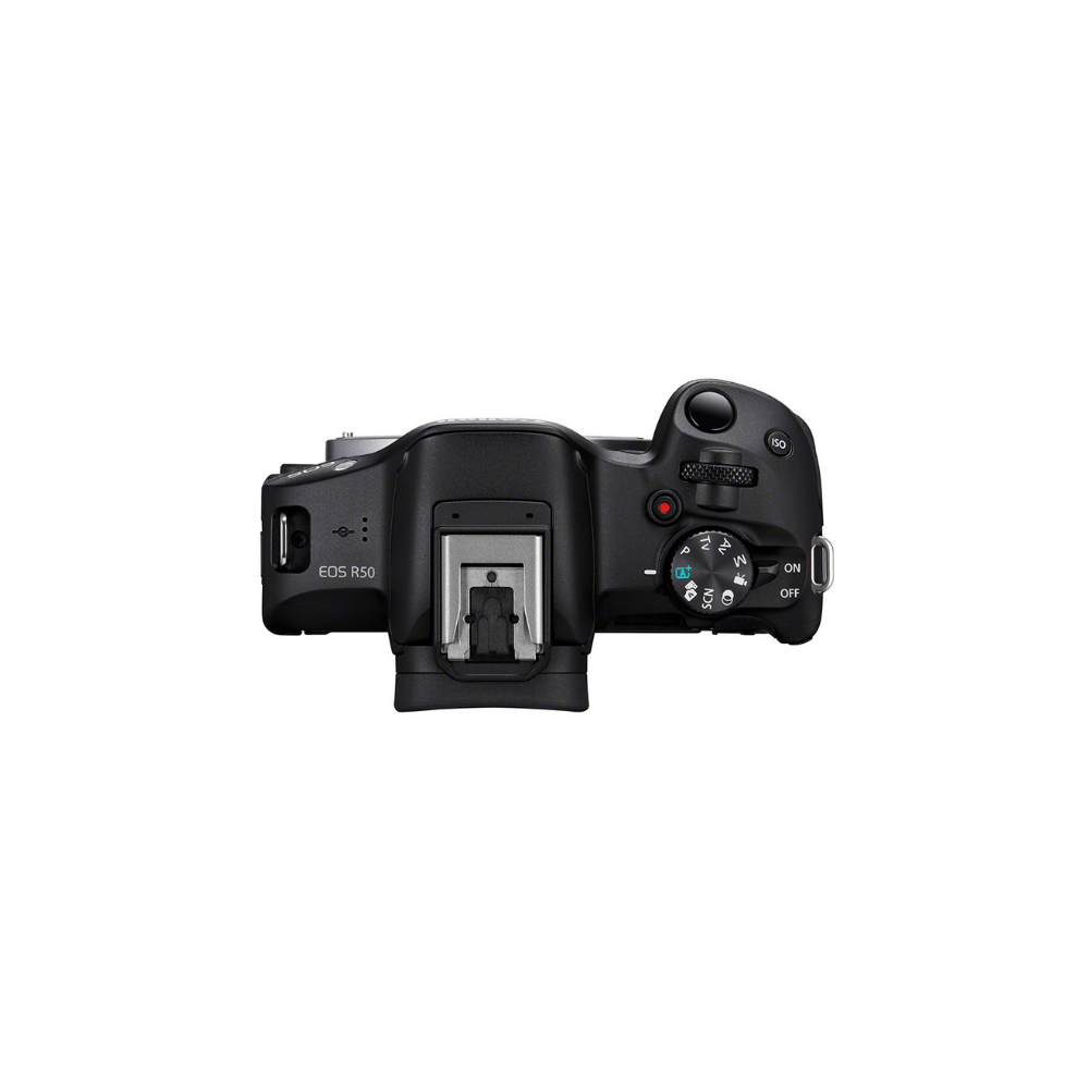 Top view of a black Canon EOS R50 camera with hot shoe and control dials.