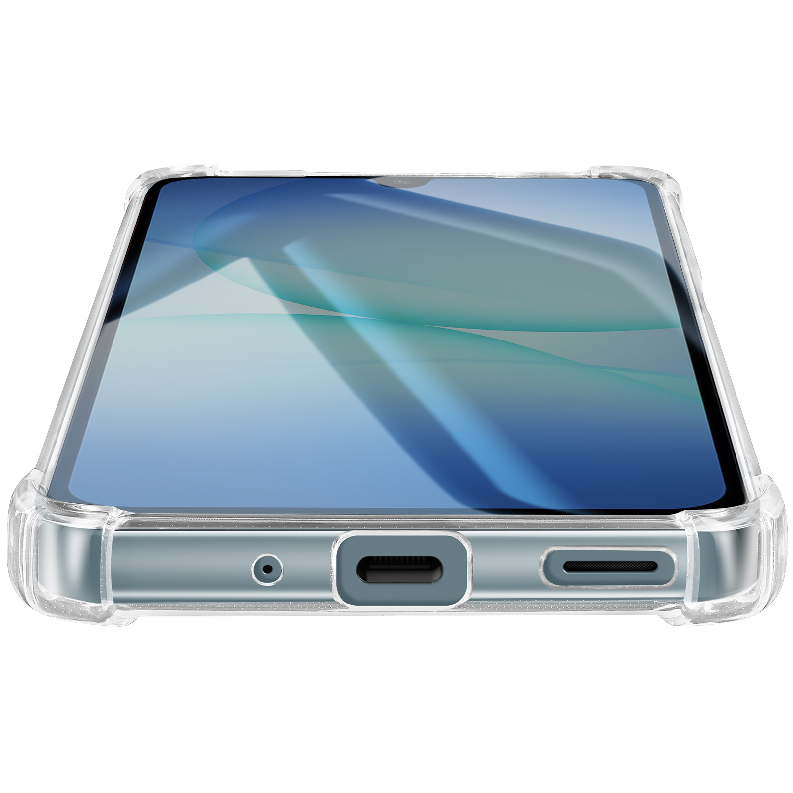 Détail de coque de téléphone transparente avec port de chargement et grille haut-parleur.