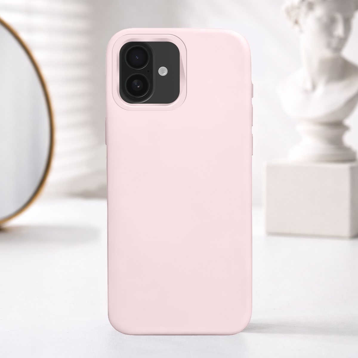 Una custodia rosa pallido per telefono con obiettivo doppio a fuoco.