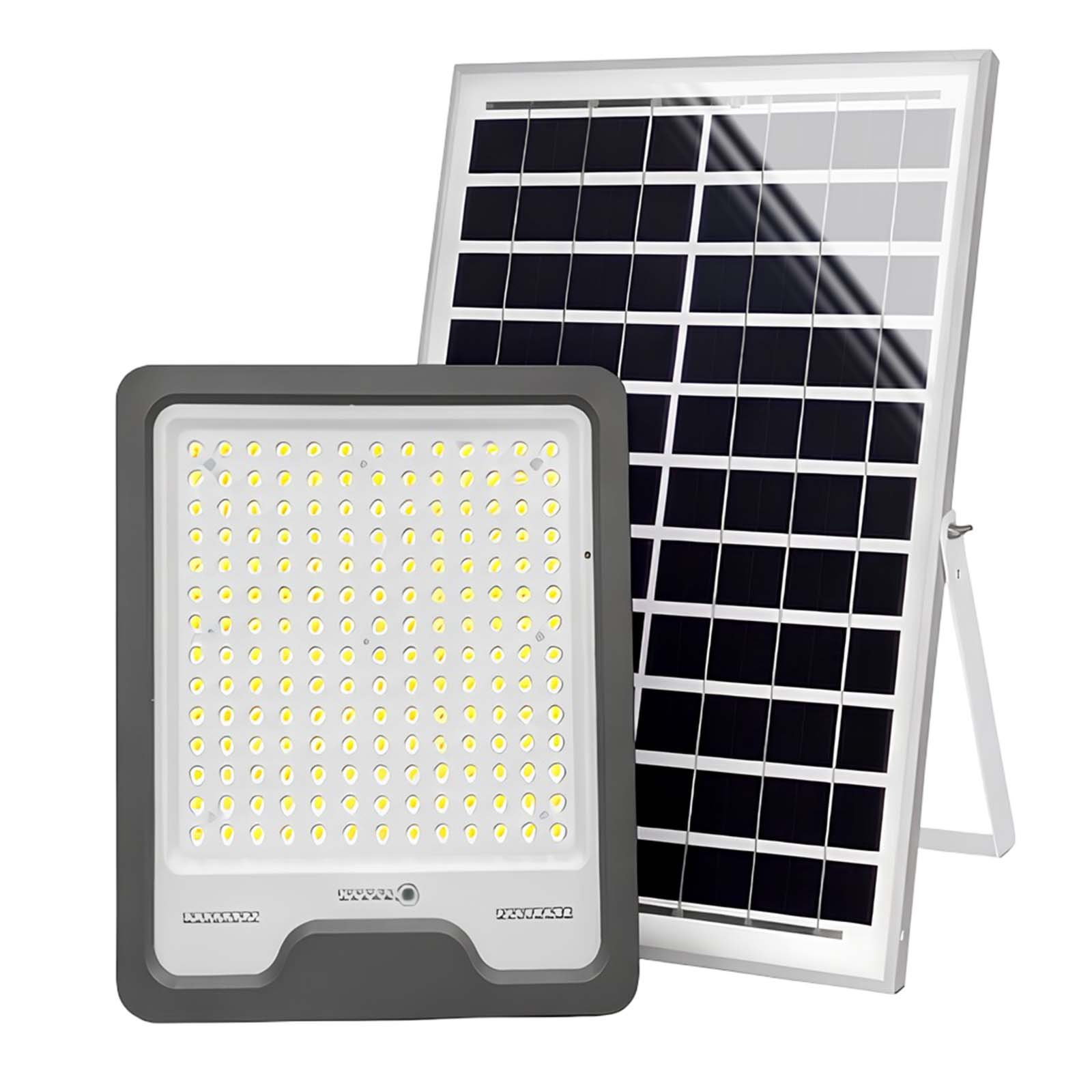 Ein Solarpanel steht hinter einem großen LED-Flutlicht mit vielen kleinen Lichtern.