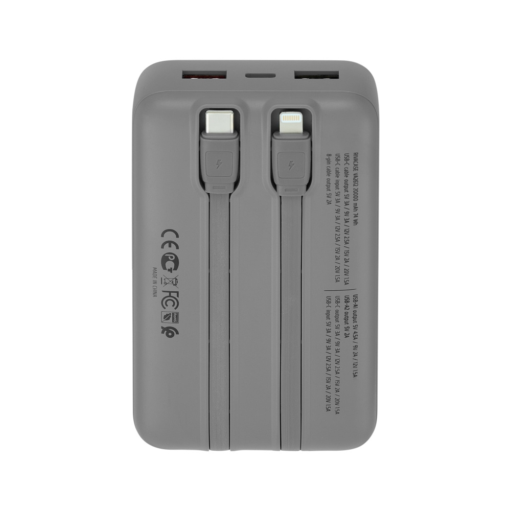 Szary powerbank z dwoma zintegrowanymi kablami (USB-C, Lightning) i portami ładowania.