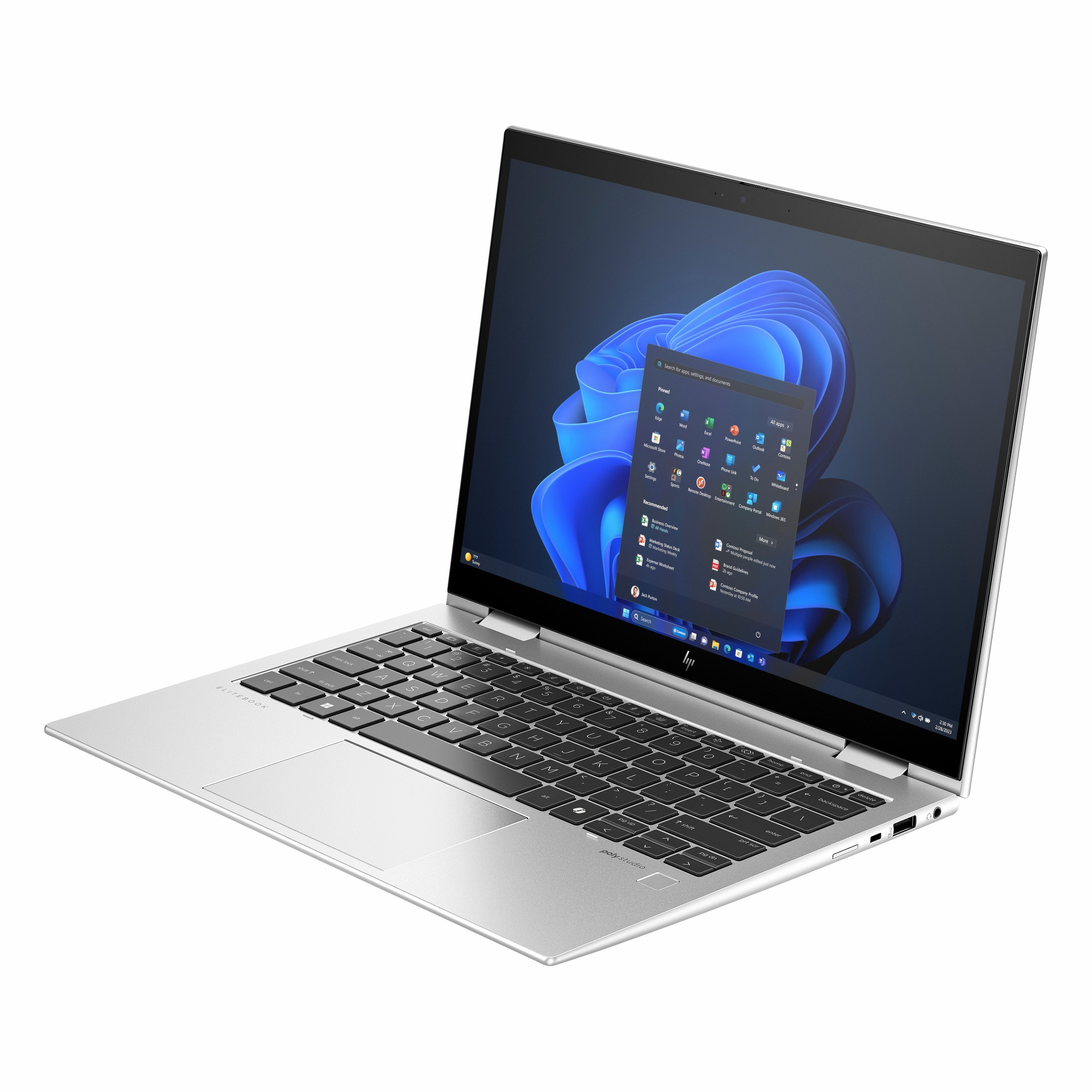 Arkadan aydınlatmalı klavyeli ve Windows 11 başlangıç menülü gümüş laptop.