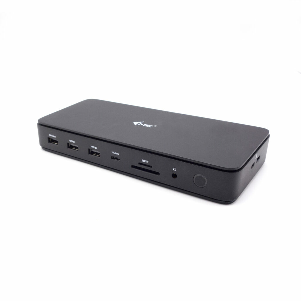 Black docking station with multiple USB ports, SD/TF card slot, and headphone jack.