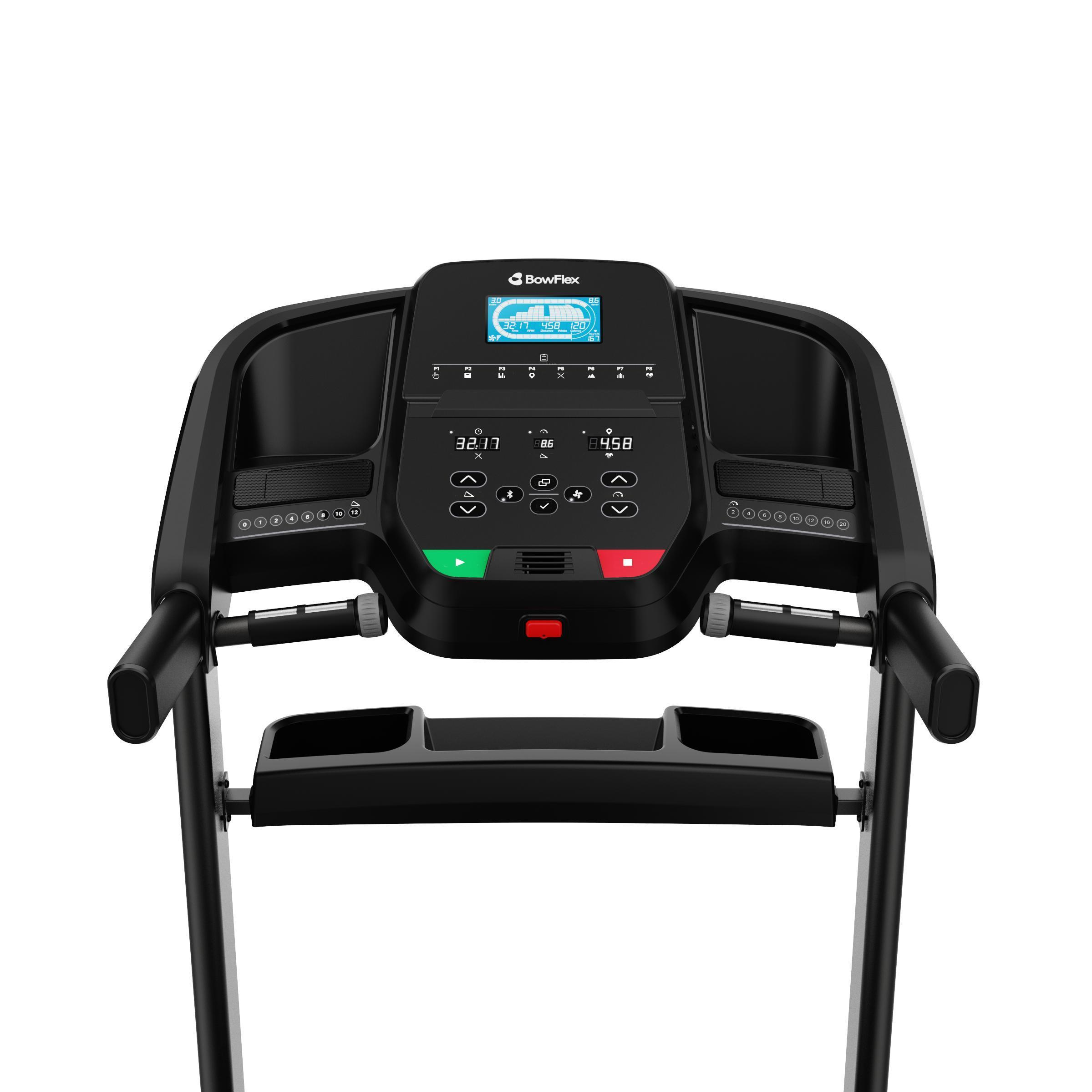 Black treadmill with a digital display, handles, and buttons.