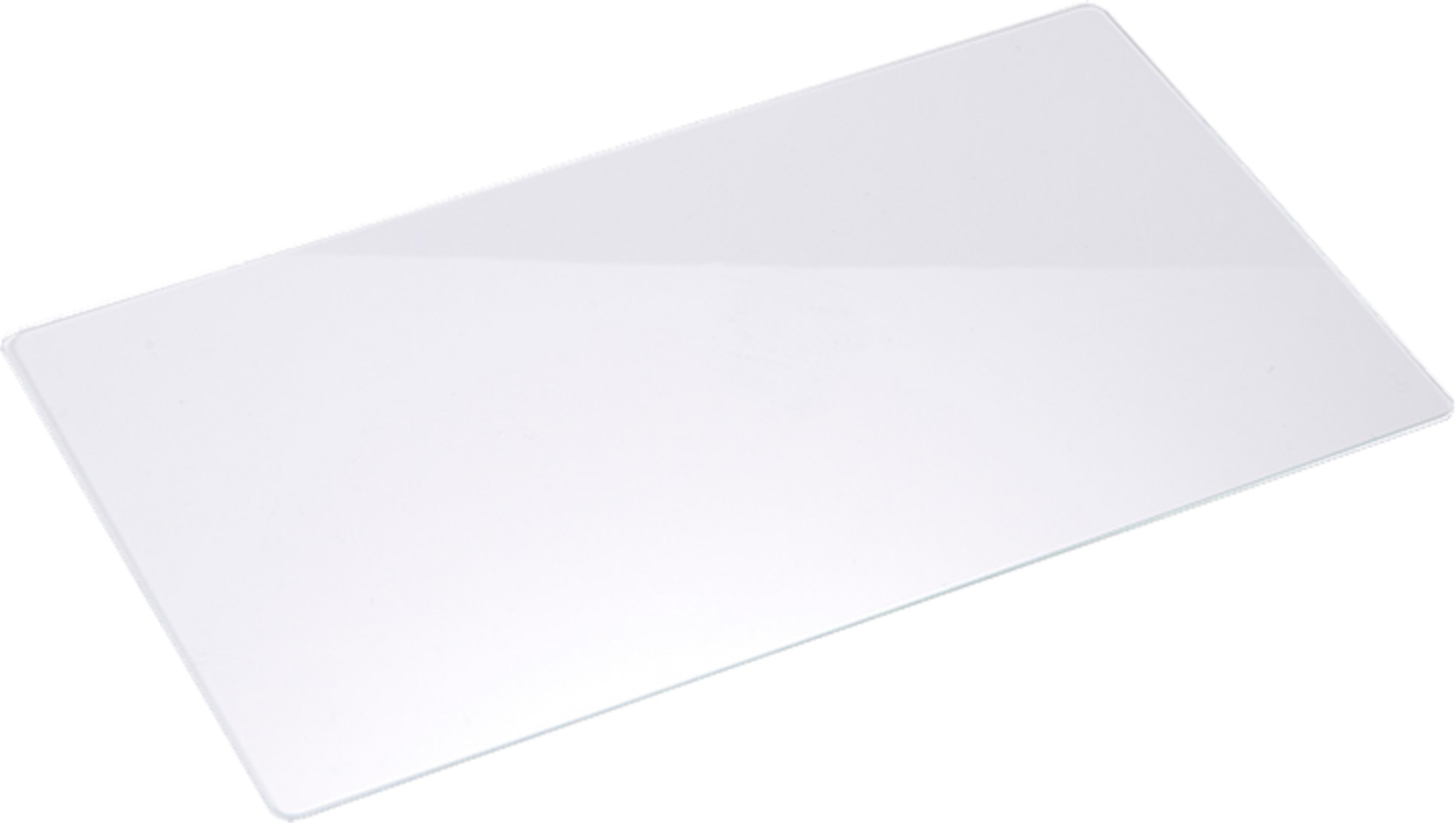 Un objeto rectangular de vidrio transparente yace sobre fondo blanco.