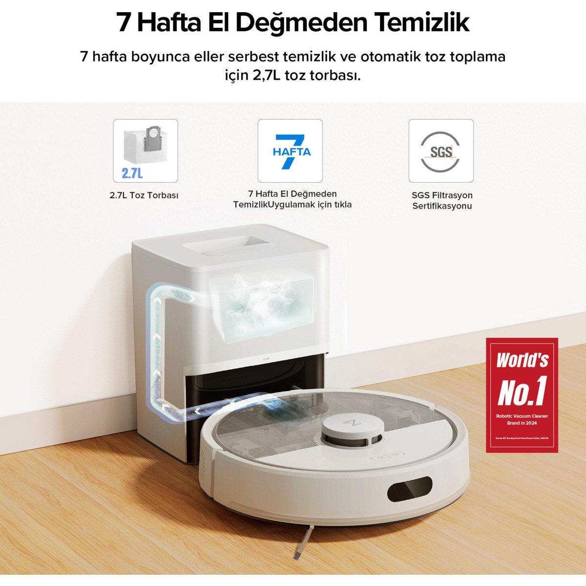 Toz toplayan beyaz robot süpürge ve şarj istasyonu.