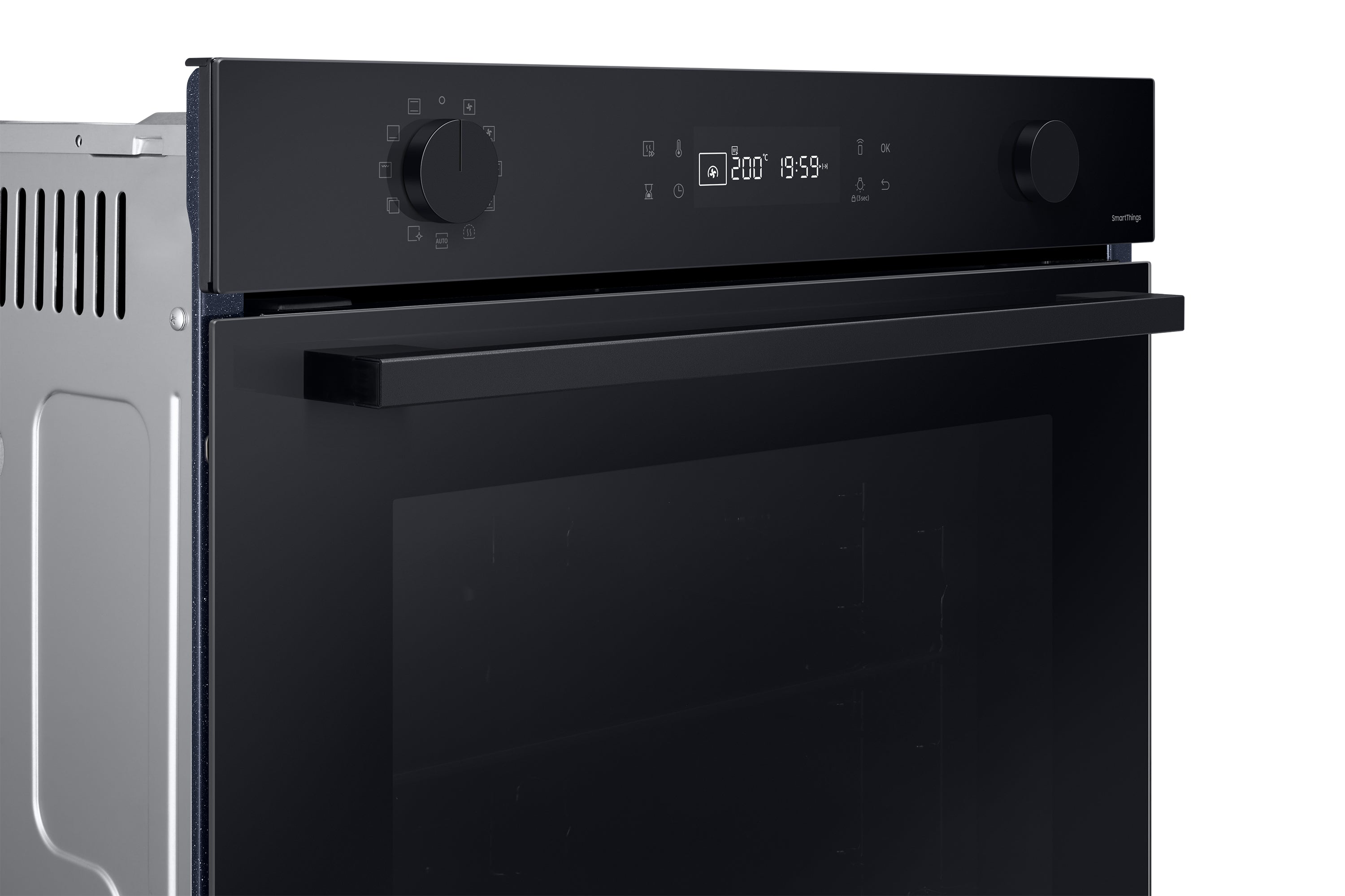 A black oven with a digital display and control knobs. Metal is on the left.