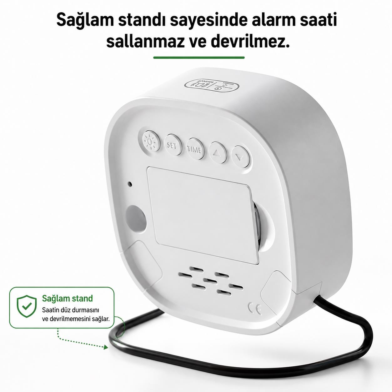 Beyaz çalar saat, devrilmeyi önleyen sağlam bir stant ile.