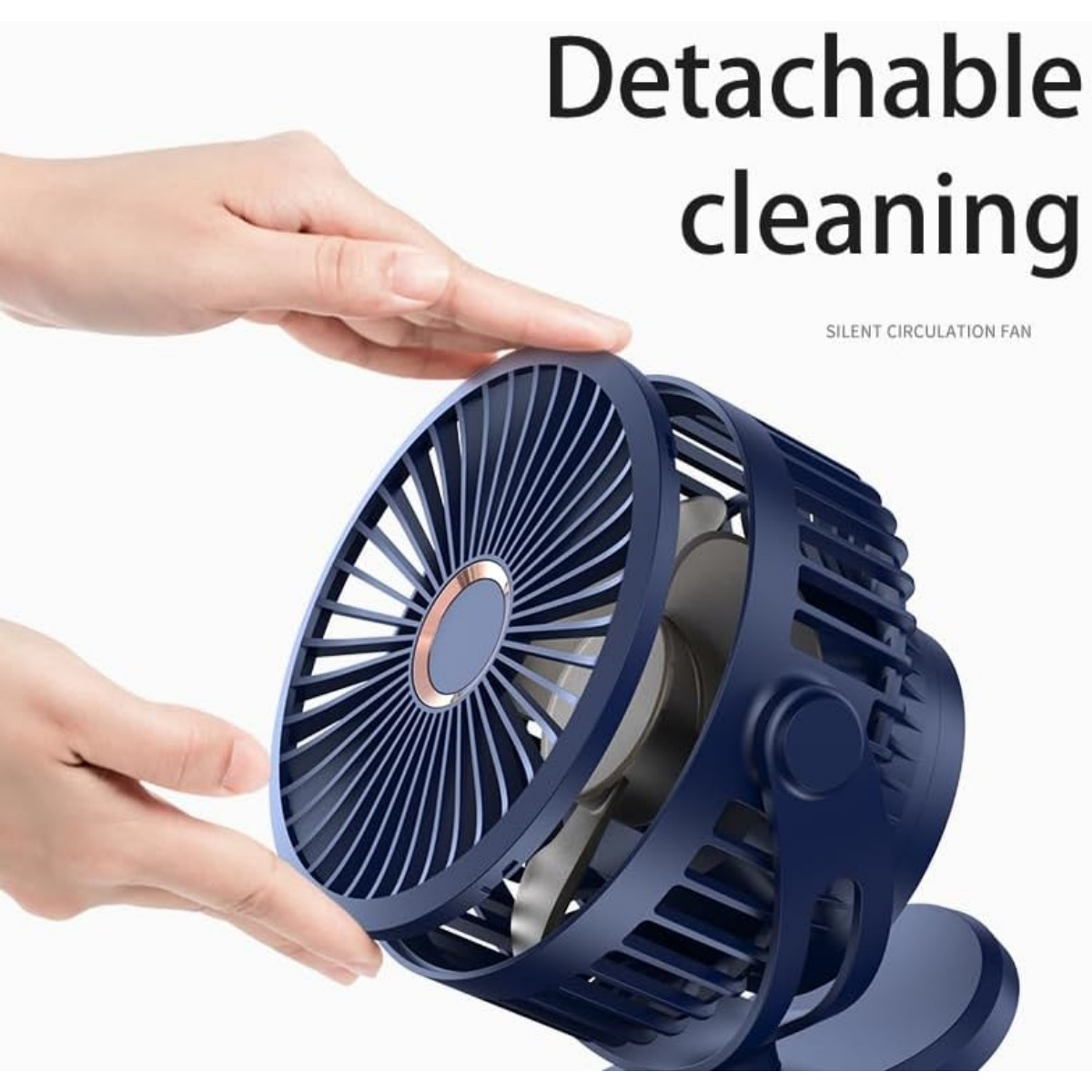 Eine Hand berührt einen blauen, abnehmbaren Ventilator mit Rotorblättern.