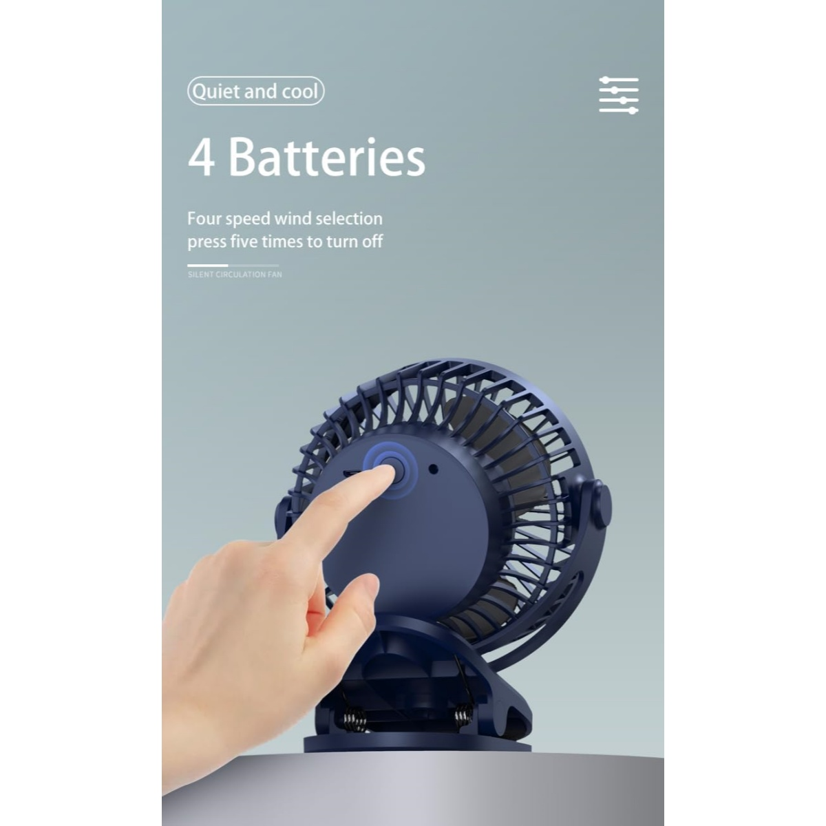 Ein Finger drückt auf den blauen Knopf eines dunklen Ventilators. 
