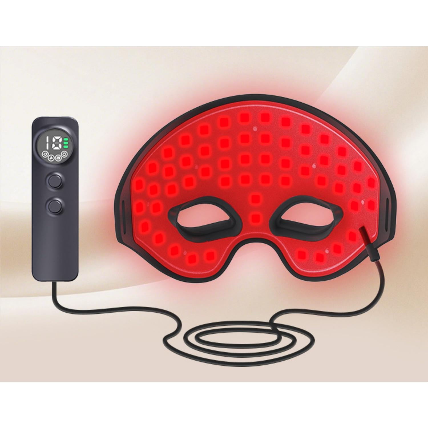 Eine rote LED-Gesichtsmaske mit einem schwarzen Fernbedienungsgerät und Kabeln.