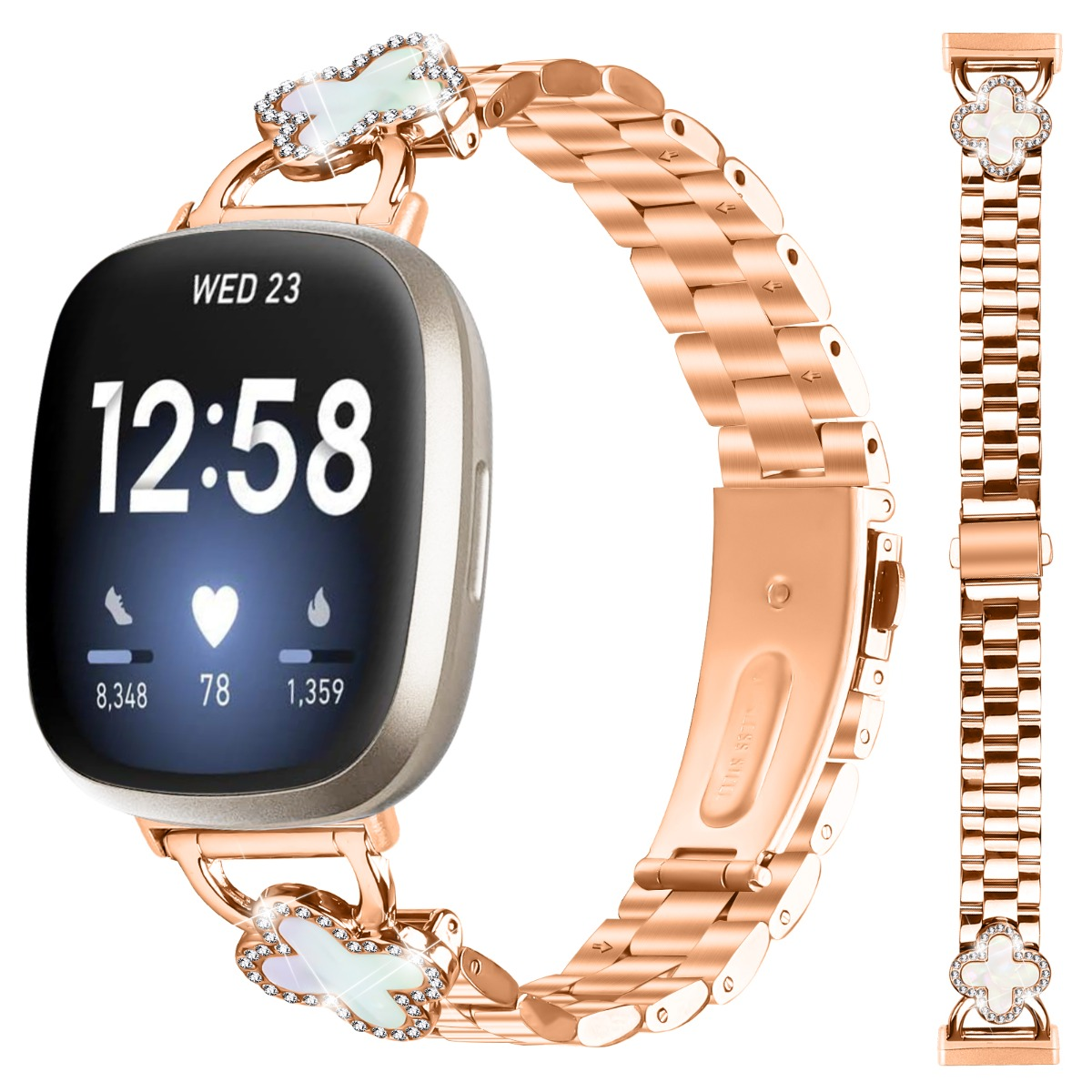 Eine roségoldene Smartwatch mit einem schmucken Armband und einem Clover-Anhänger.