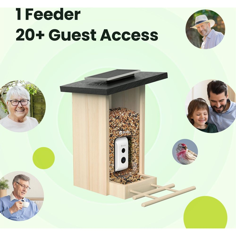 Ein Vogelhaus mit Kamera, gefüllt mit Samen, daneben ein Mann mit Kind und eine ältere Frau.