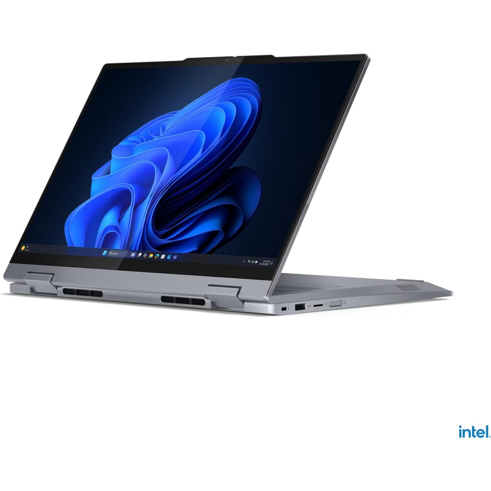 Mavi bir Windows duvar kağıdı gösteren açık ekranlı gümüş rengi bir dizüstü bilgisayar.
