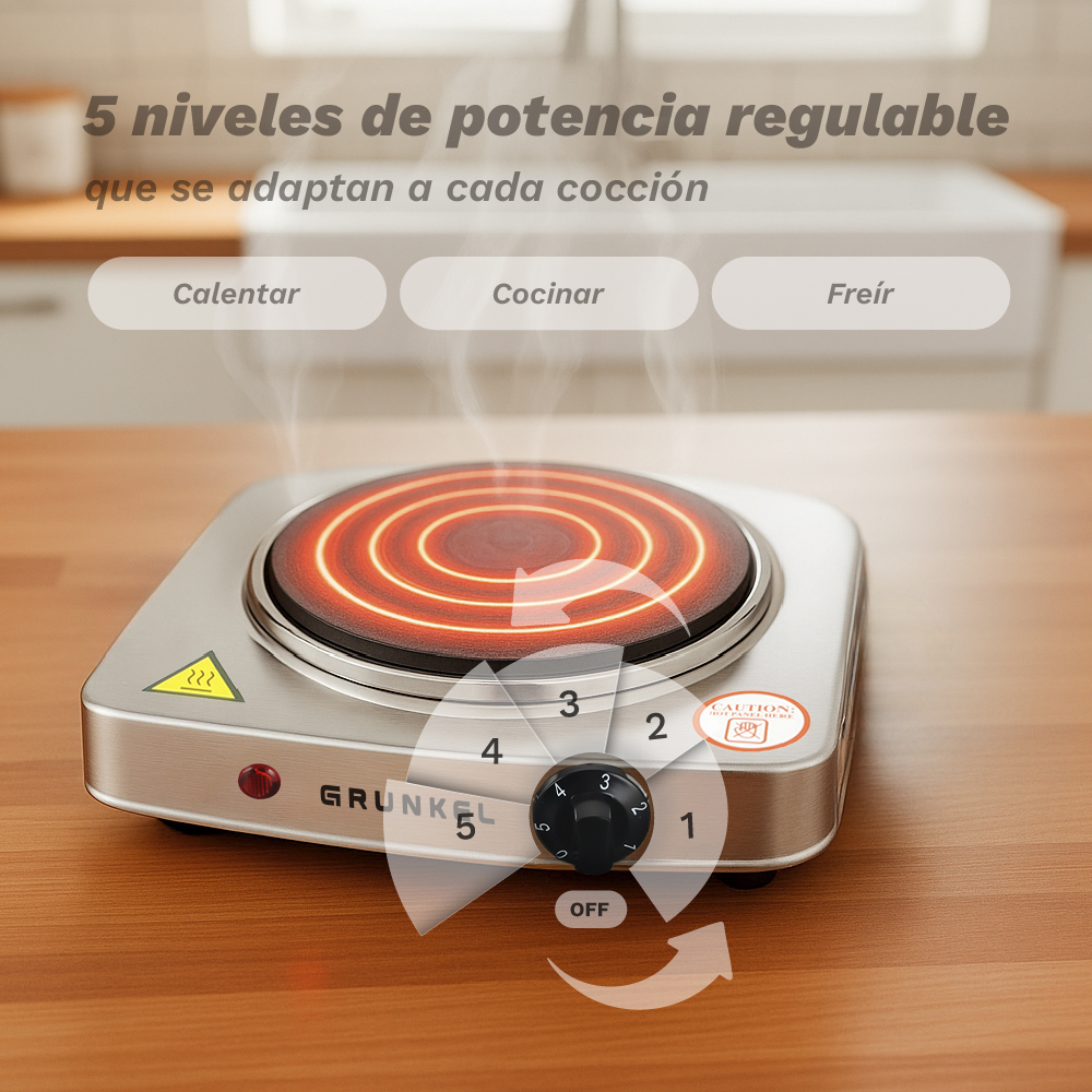 Una placa eléctrica plateada con serpentín brillante y mando giratorio.