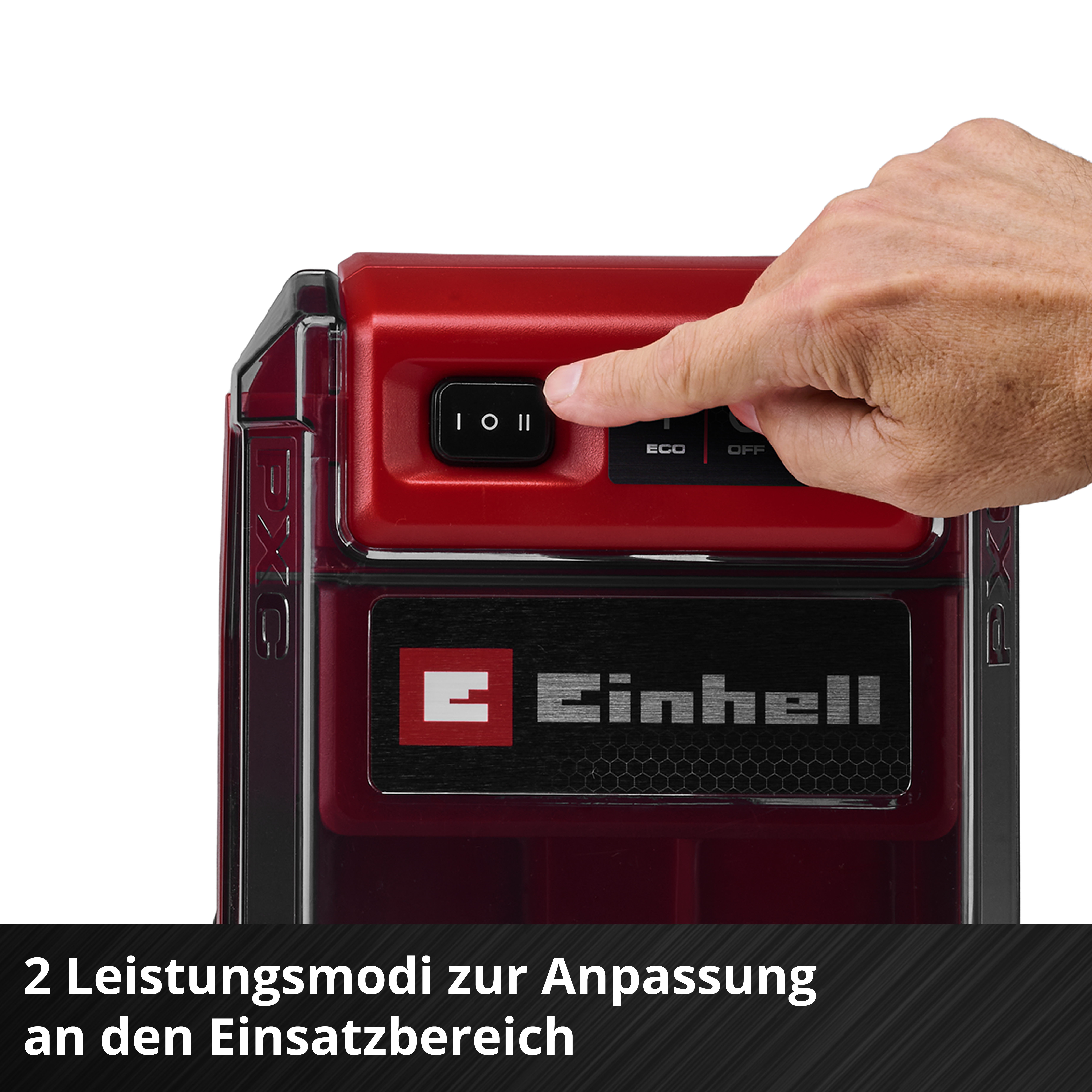 Ein Finger drückt einen Schalter an einem roten Werkzeug mit dem Einhell-Logo.