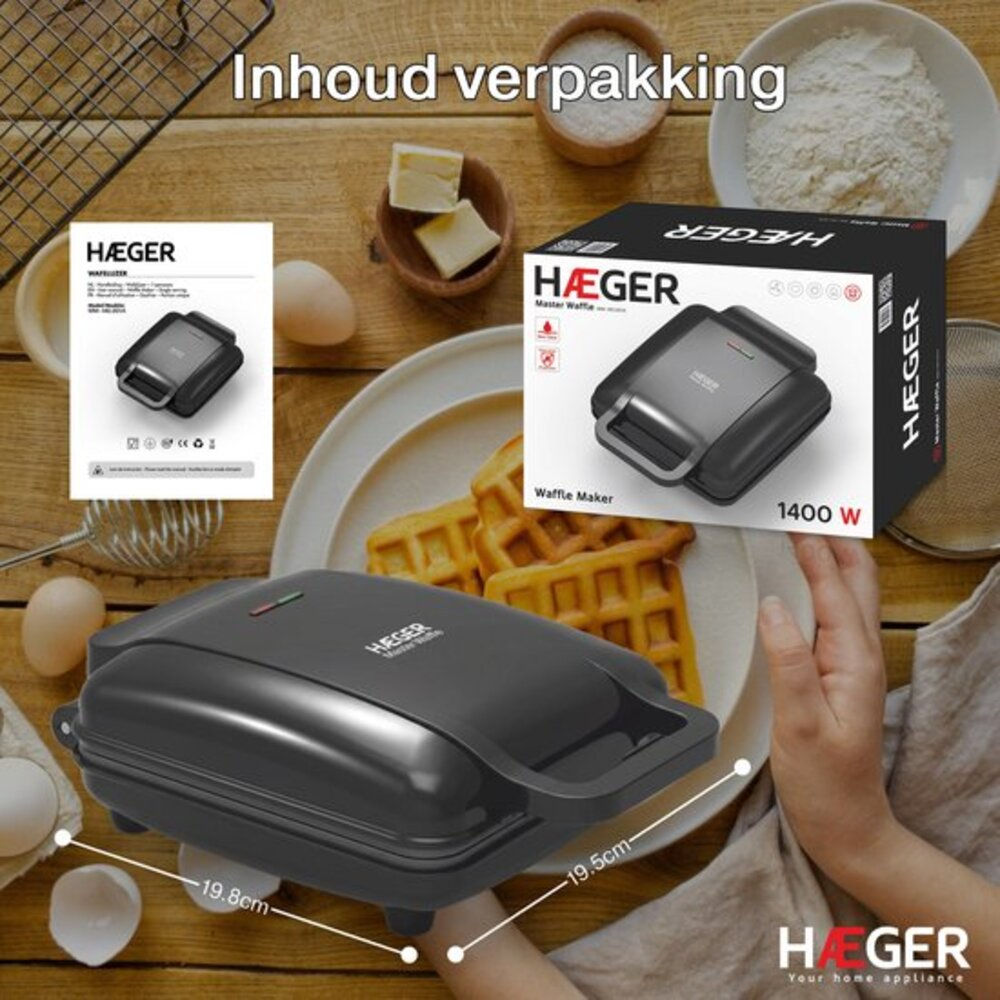A black waffle maker with waffles, eggs, butter, and flour on a wooden table.