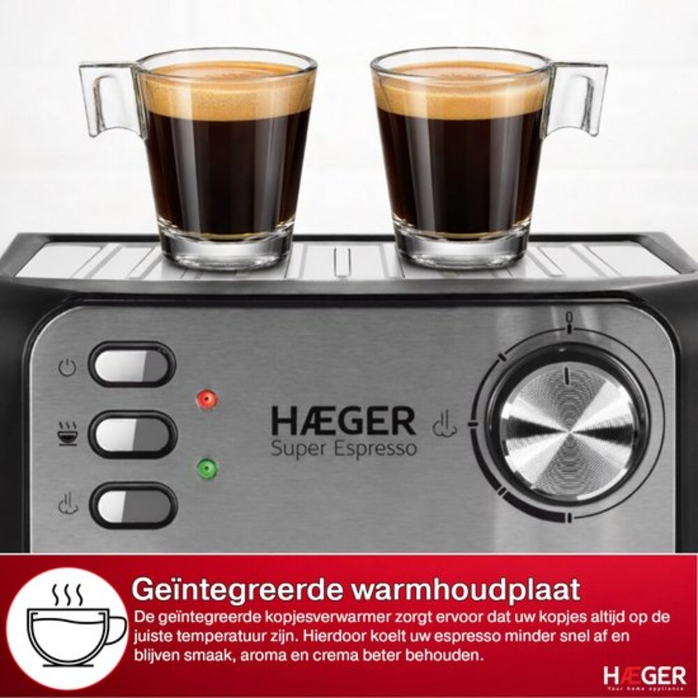 Two espresso cups sit on a coffee machine with control buttons and a dial.