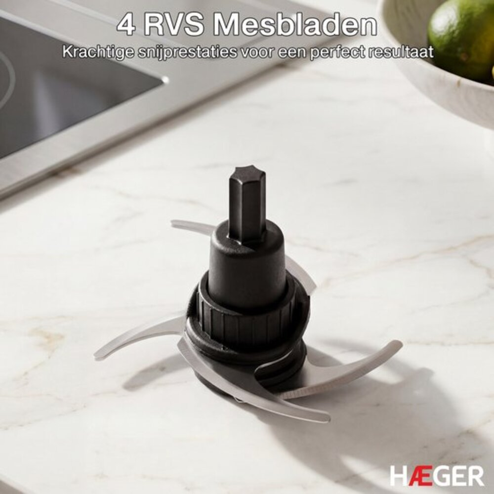 Sharp 4-blade chopper attachment on a marble countertop.