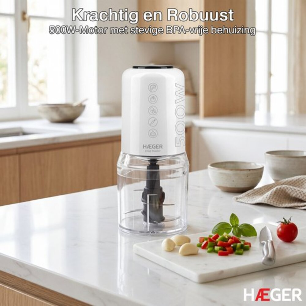 A white 500W motor food chopper sits on a marble countertop with ingredients.