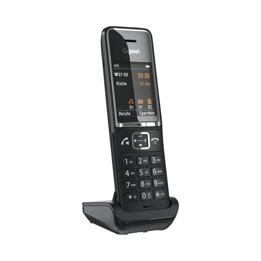 Un teléfono inalámbrico Gigaset negro está en su base de carga.