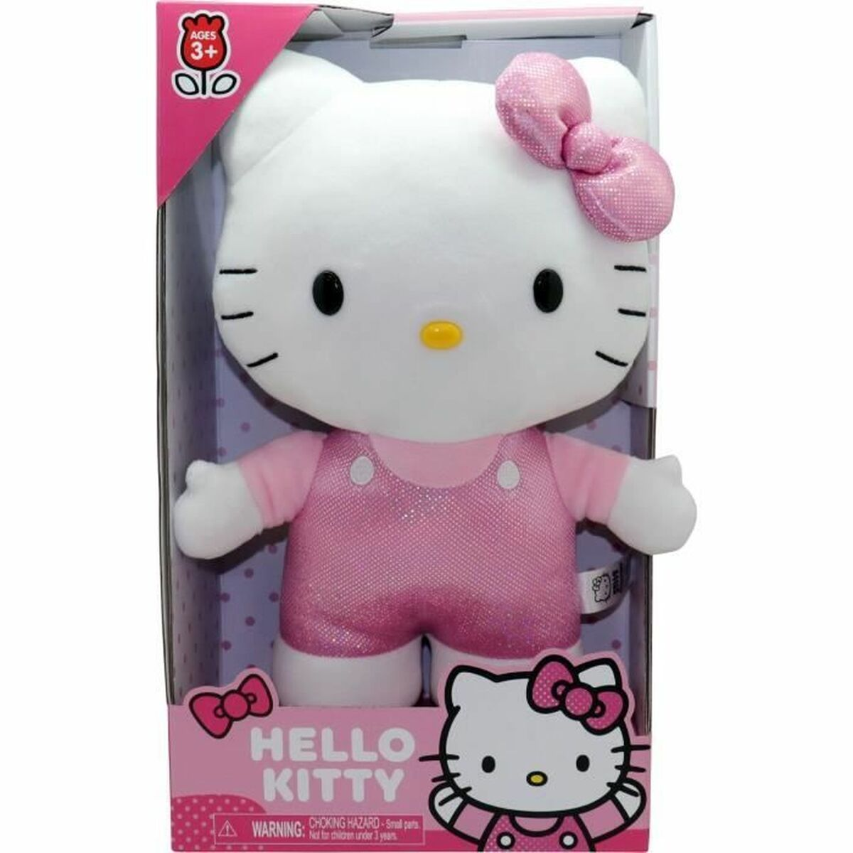 Eine weiße Hello Kitty-Puppe mit rosa Latzhose und Schleife im Karton.