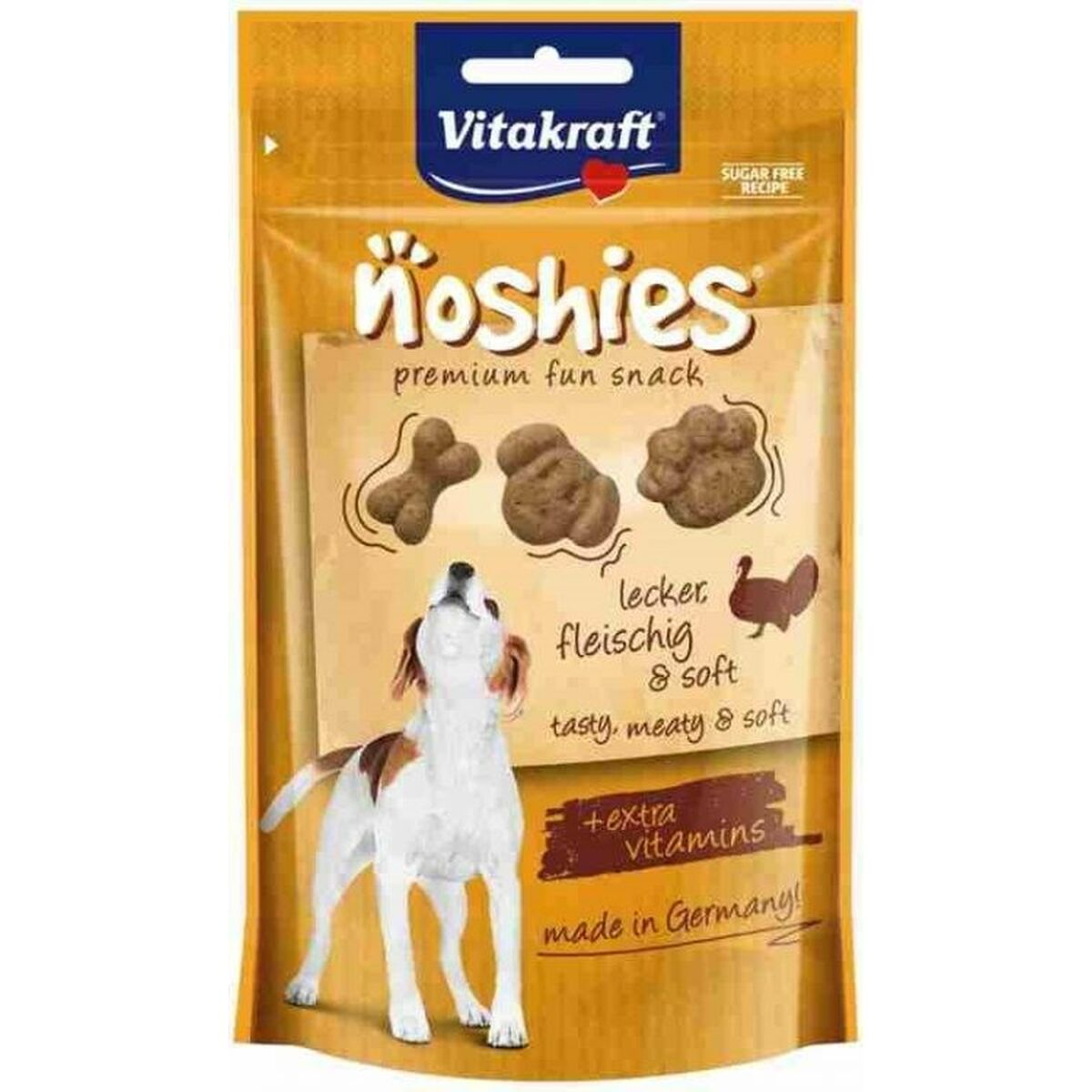 Paquete de golosinas para perros con un perro y varias formas de golosinas.