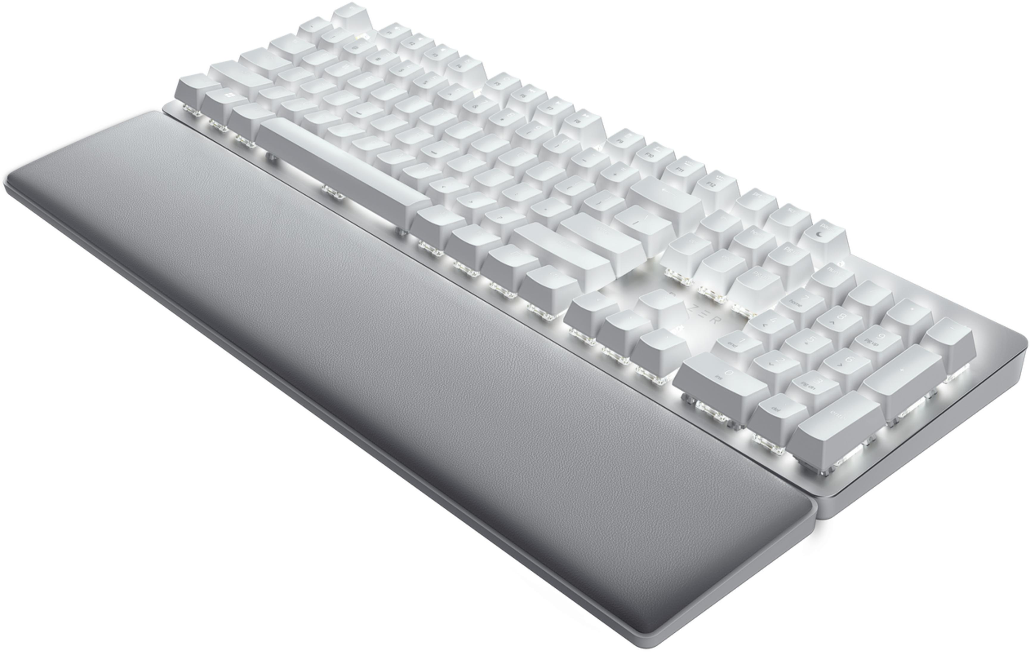 Ein weißes Gaming-Keyboard mit grauer Handballenauflage, beleuchteten Tasten.