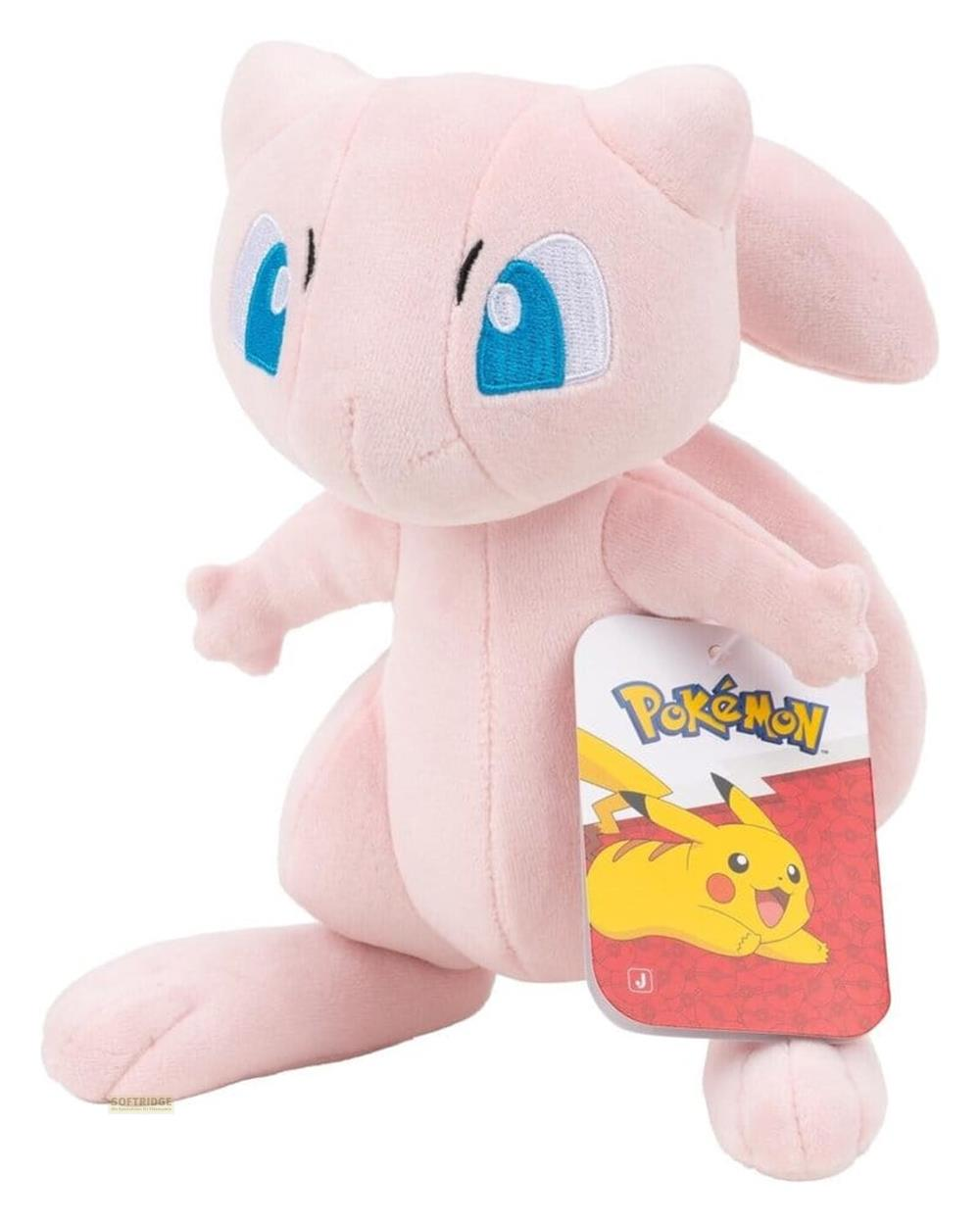 Ein rosafarbener Mew-Plüsch mit blauen Augen und einem Pokémon-Tag mit Pikachu.