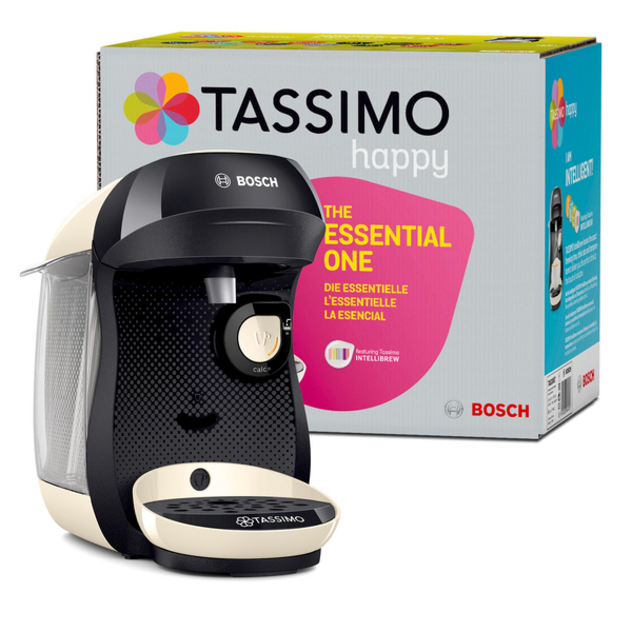 Eine beige und schwarze Tassimo Kaffeemaschine mit Verpackung.