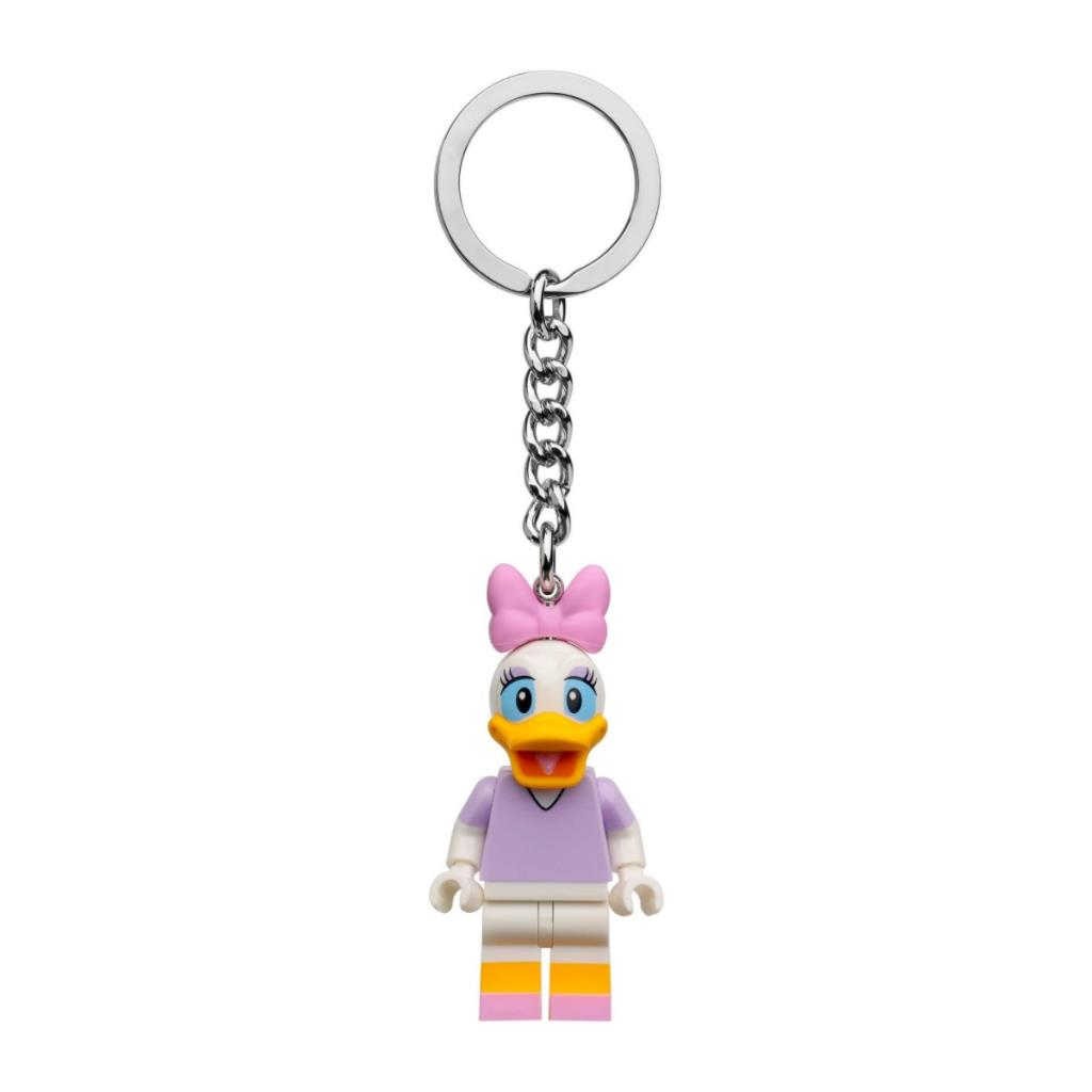 Pembe fiyonklu, mor tişörtlü ve sarı çizgili Daisy Duck Lego anahtarlık.