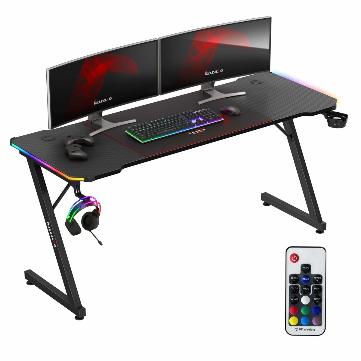 Czarny stół gamingowy z dwoma monitorami, klawiaturą, myszą, kontrolerami i oświetleniem RGB.