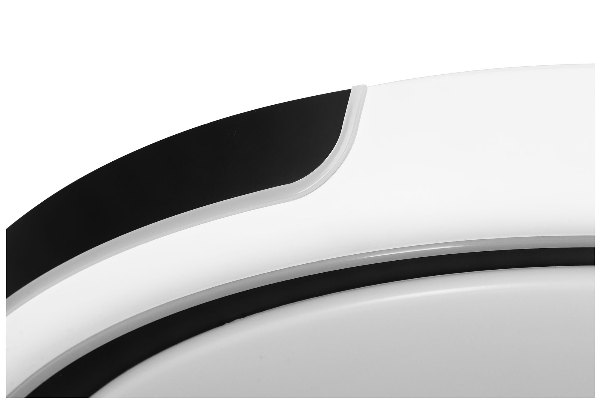 Primer plano de un dispositivo blanco y negro con líneas curvas.
