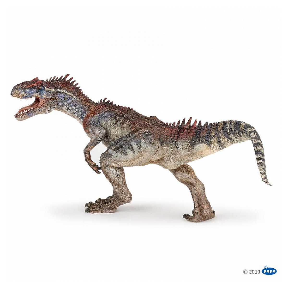 Ein beiger Dinosaurier mit roten und blauen Akzenten steht auf weißem Grund.