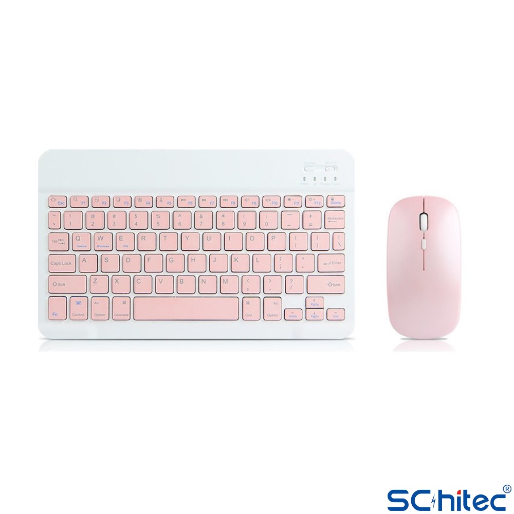 Beyaz arka plan üzerinde pembe kablosuz klavye ve fare seti.
