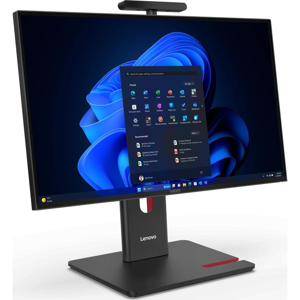 Un ordinateur tout-en-un Lenovo avec un grand écran affichant le menu Démarrer de Windows 11.