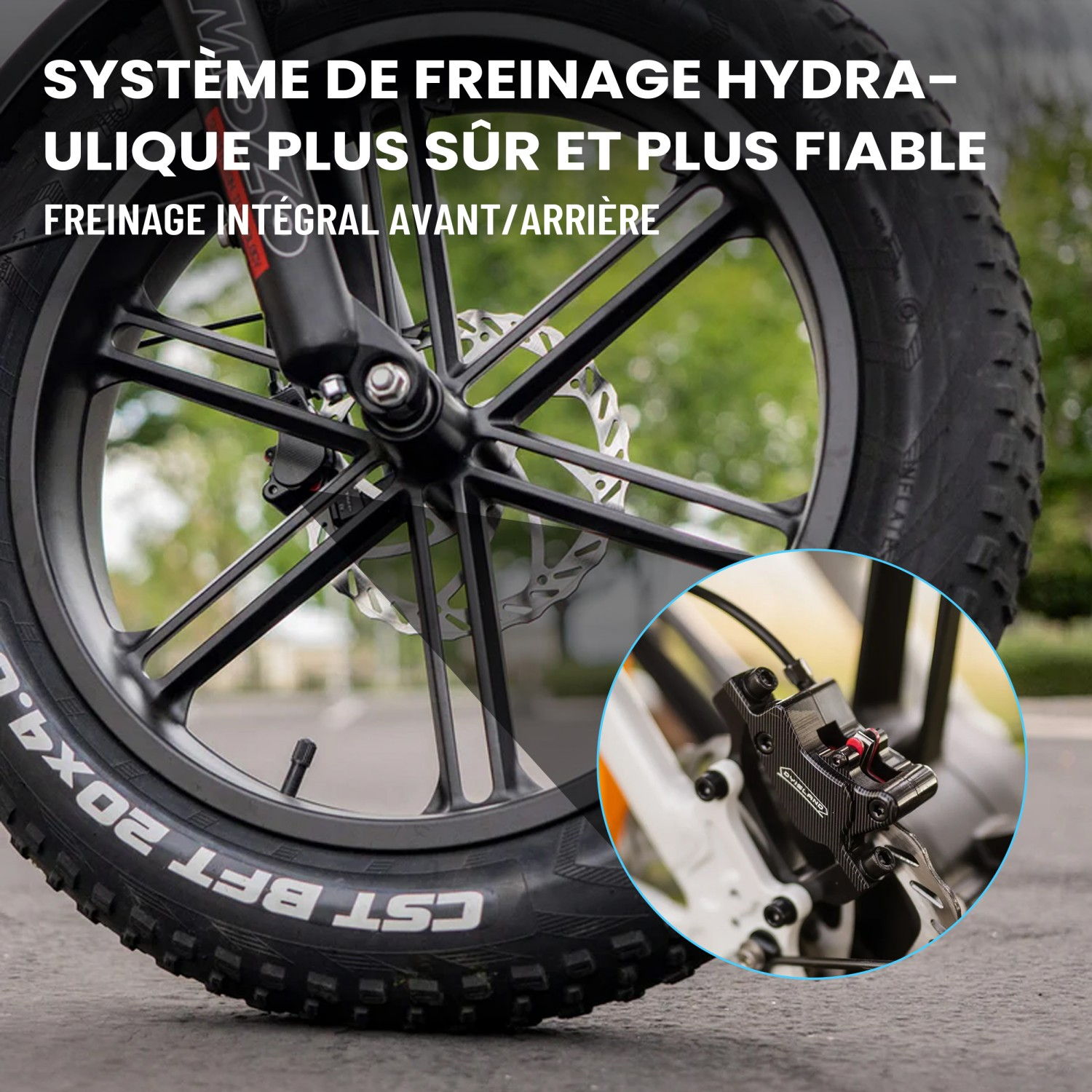 Zbliżenie na hydrauliczny hamulec tarczowy roweru i oponę.
