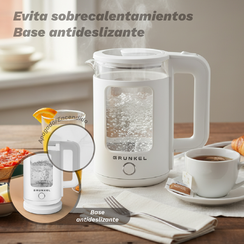 Un hervidor eléctrico blanco hierve agua, con té y desayuno cerca.