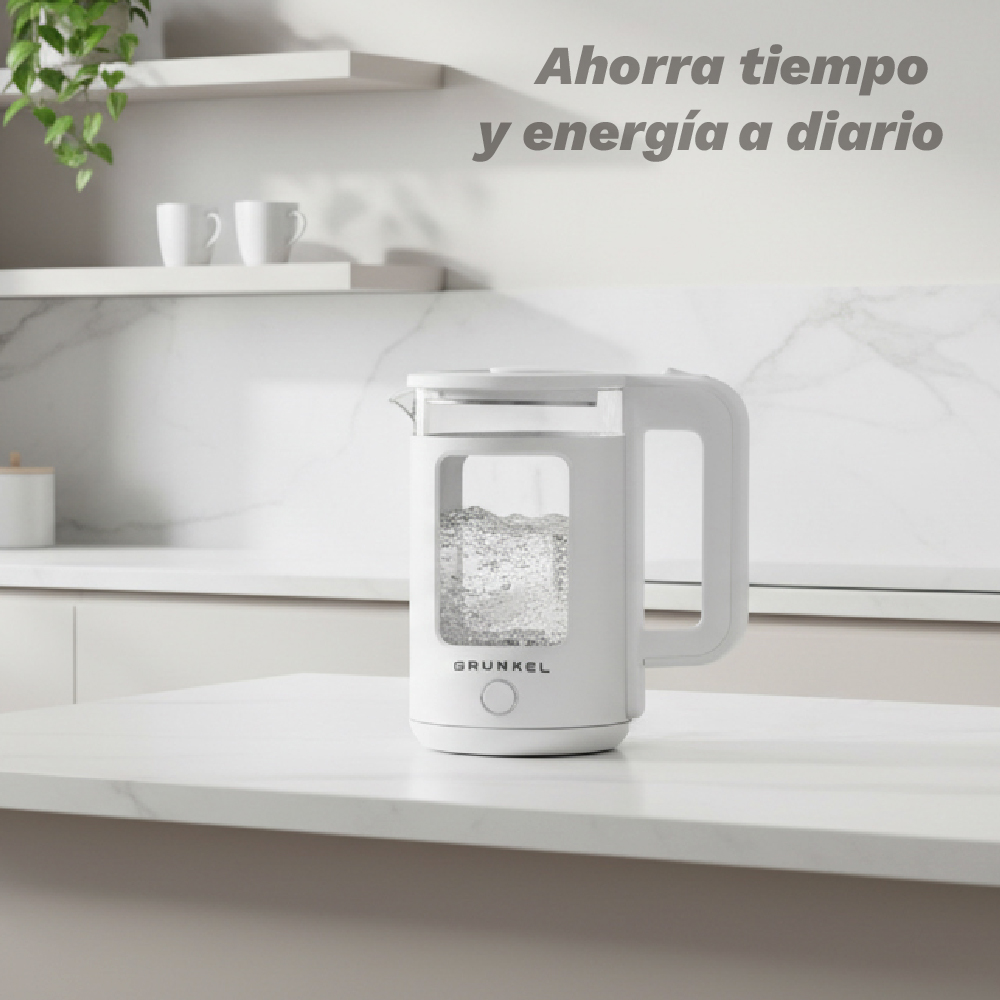 Un hervidor eléctrico blanco con agua burbujeante en una encimera.
