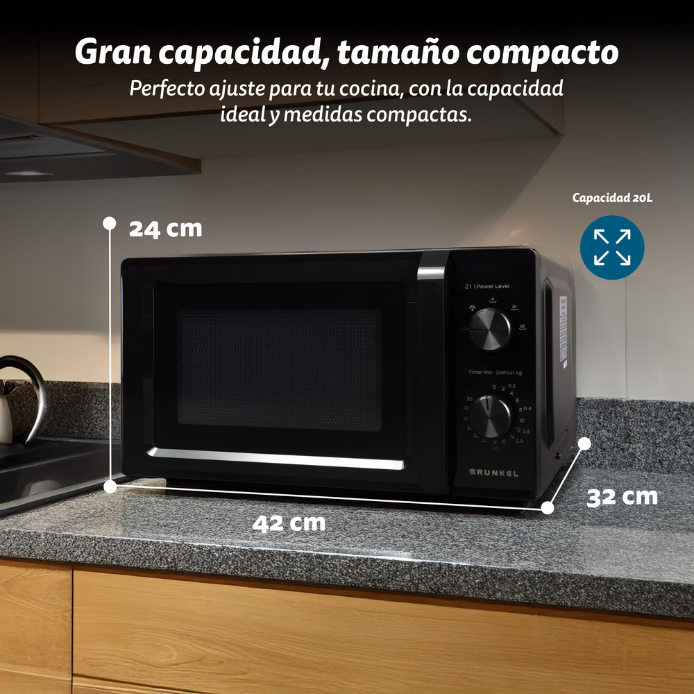 Forno a microonde nero 42x24x32cm con capacità 20L su piano di lavoro.