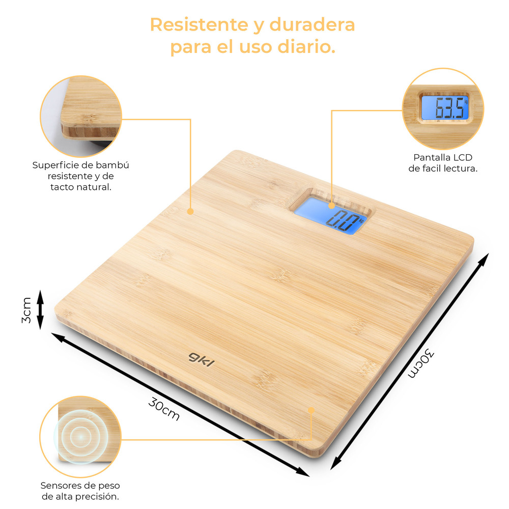 Una báscula de baño de madera con pantalla LCD y dimensiones.