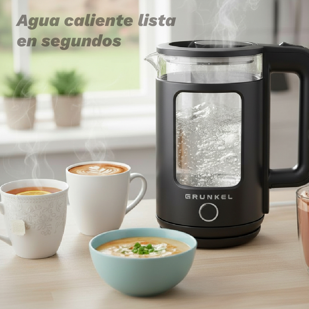 Un hervidor eléctrico negro hierve agua junto a tazas de té, café y un cuenco de sopa.