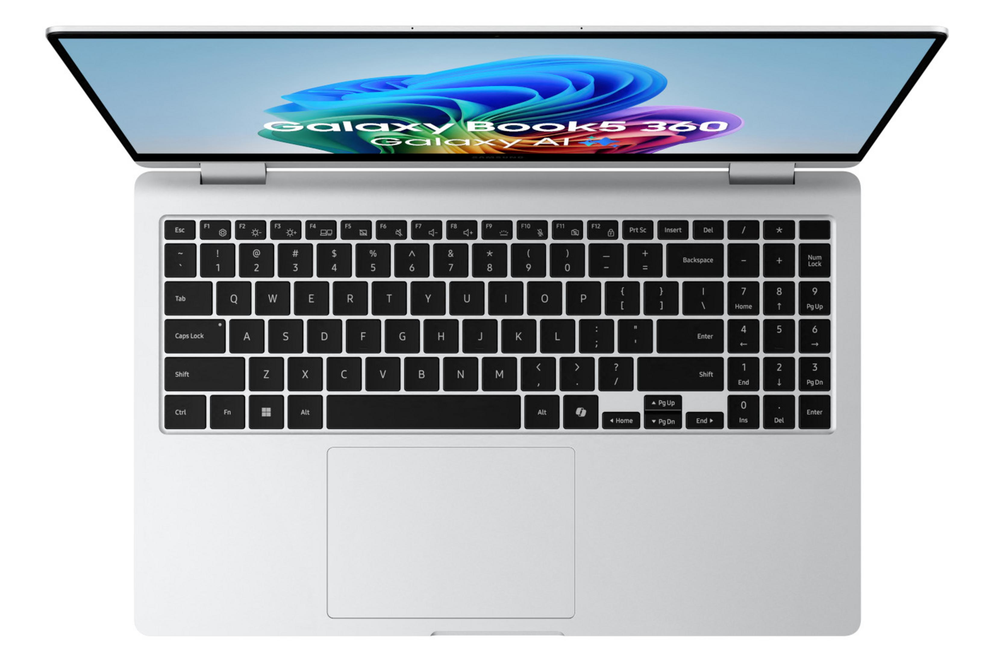 Un ordinateur portable Samsung Galaxy Book 5 360 argenté ouvert avec fond d'écran bleu.