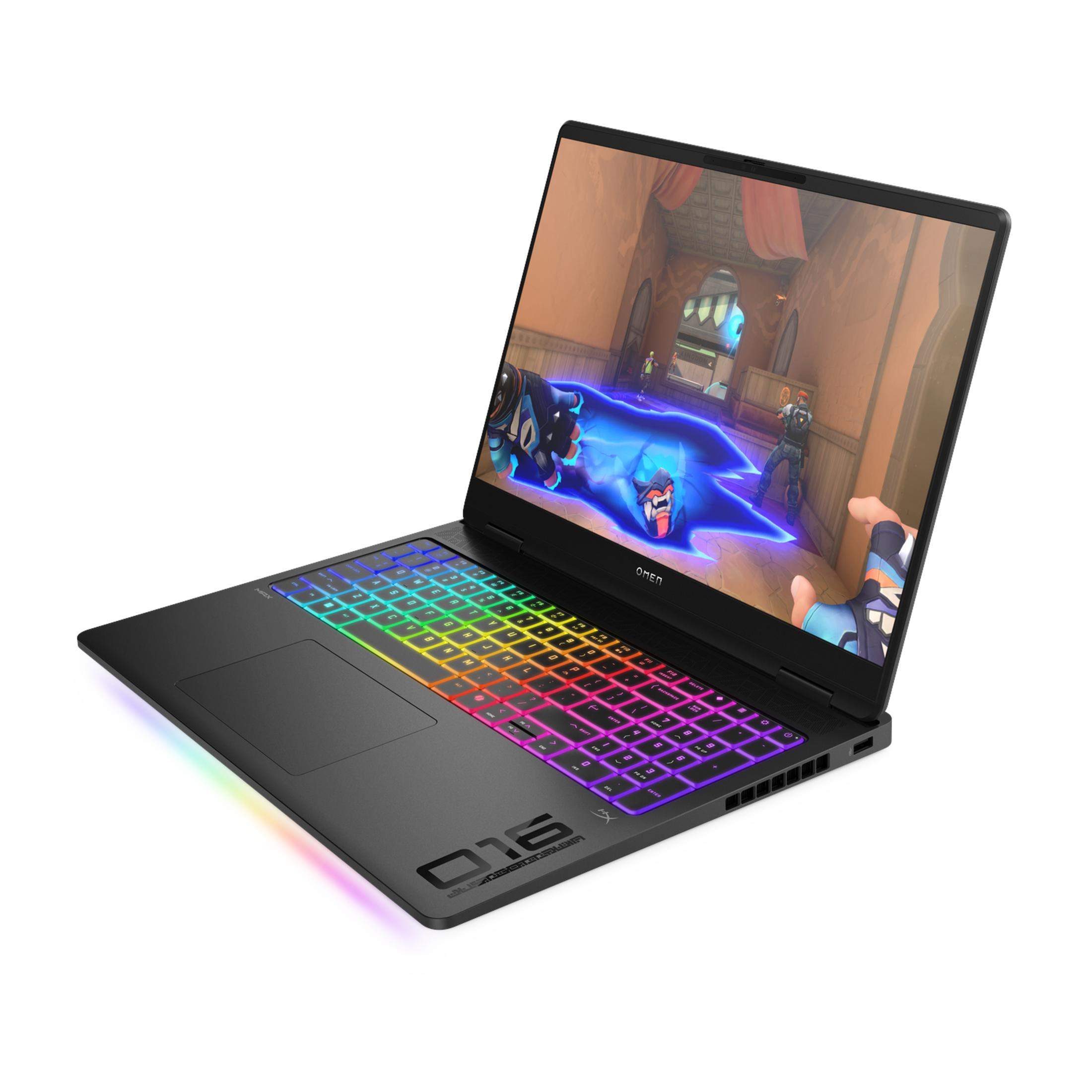 Zwarte laptop met RGB-toetsenbord, toont een videogame met blauwe energie-effecten.