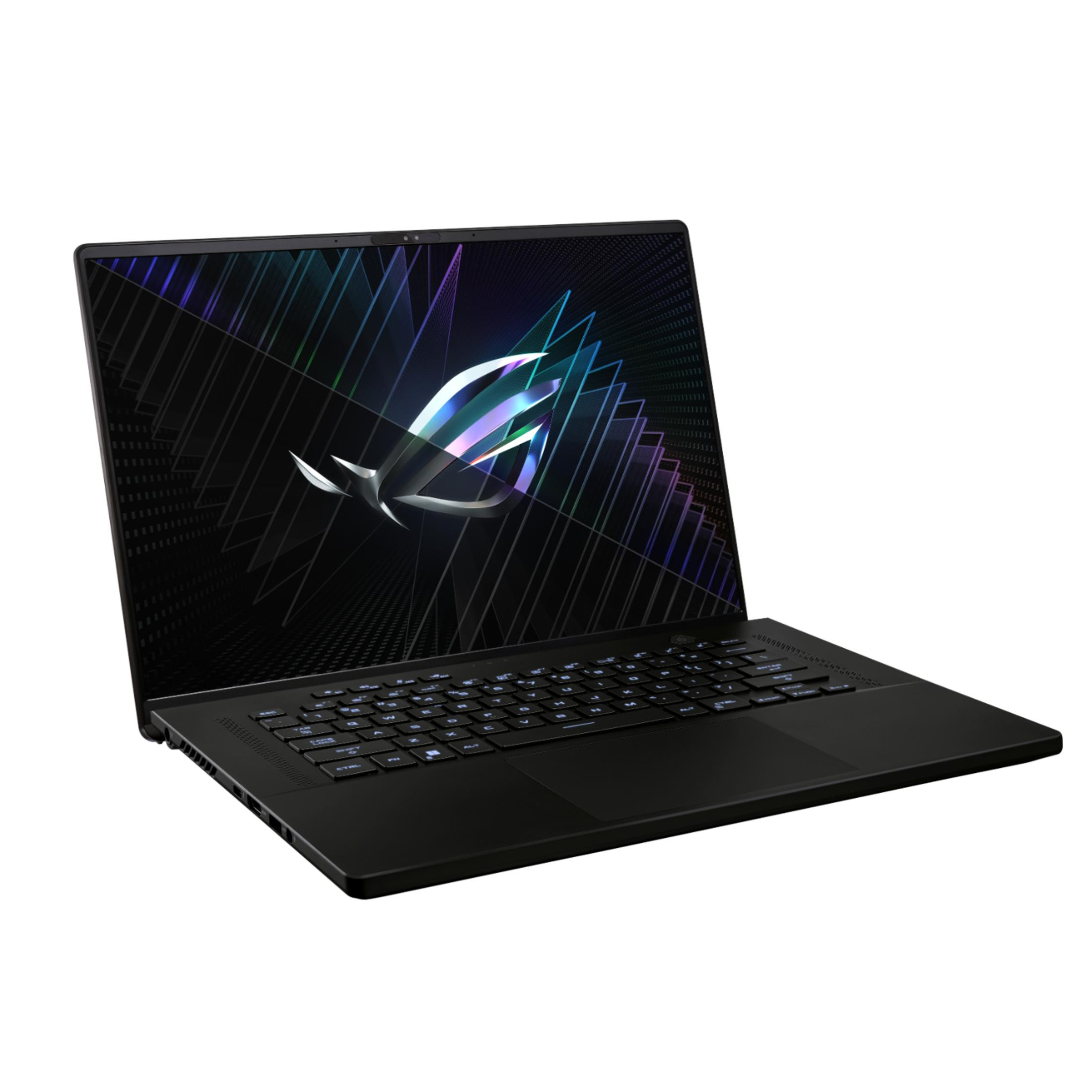 A black laptop with a glowing logo on screen and illuminated keyboard.