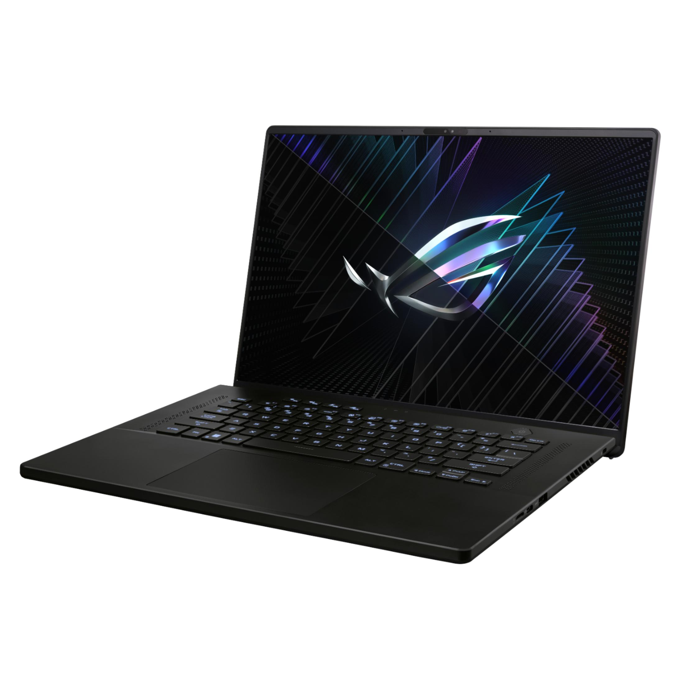 Black laptop with illuminated keyboard and ROG logo on screen.